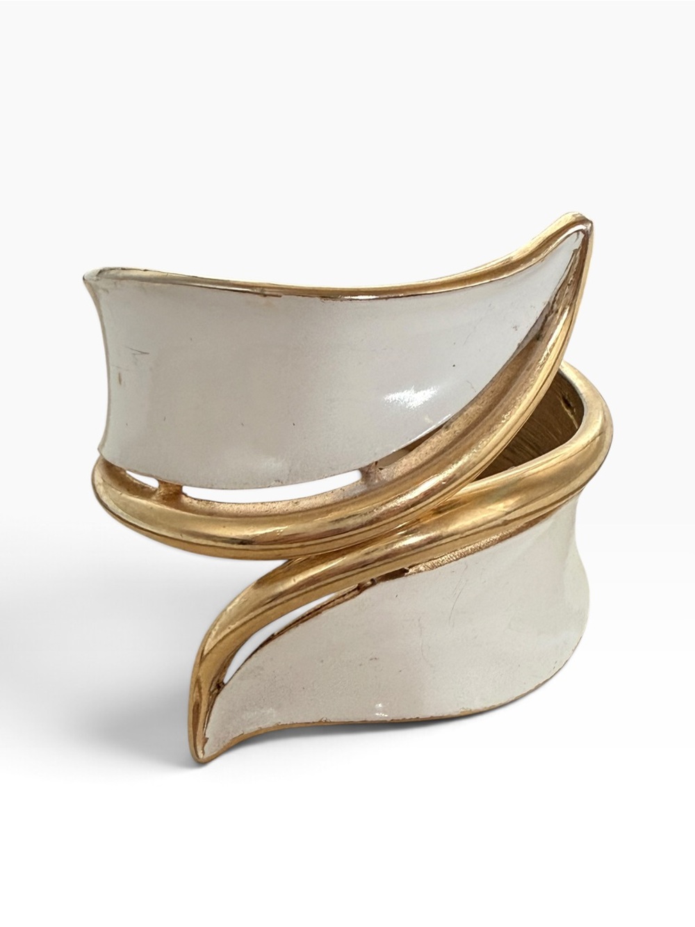 mid-century Crown Trifari hinged clamper bracelet white enamel and gold tone
